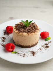 Delicious chocolate mousse cake with raspberries.