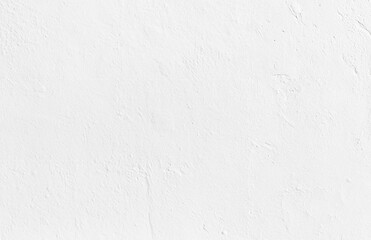 White plaster wall with subtle texture, rough surface, and natural imperfections. Ideal for backgrounds and designs.