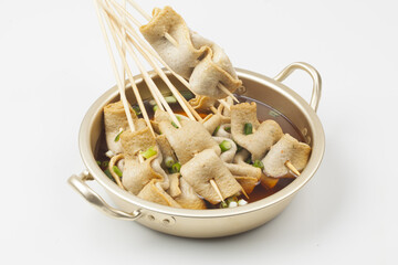  Fish cake soup is a food made by crushing fish flesh, adding additional ingredients such as salt, and cooking it to coagulate it.