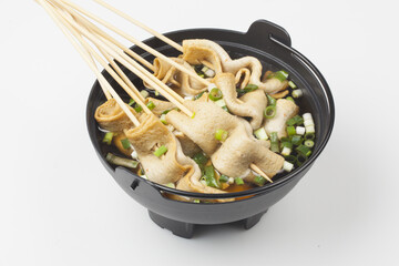  Fish cake soup is a food made by crushing fish flesh, adding additional ingredients such as salt, and cooking it to coagulate it.