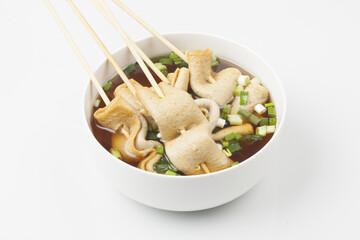  Fish cake soup is a food made by crushing fish flesh, adding additional ingredients such as salt, and cooking it to coagulate it.