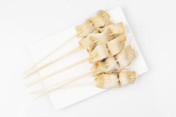  Fish cake soup is a food made by crushing fish flesh, adding additional ingredients such as salt, and cooking it to coagulate it.