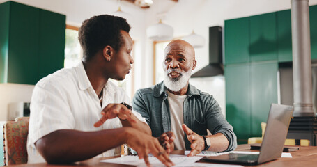 Father, son and help with bills in home for finance paperwork, advice or mortgage application with...