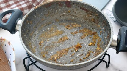 Tips for cleaning an empty frying pan after cooking