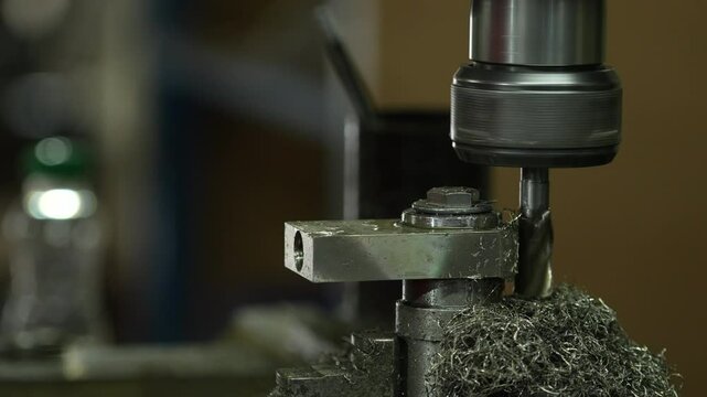 VDO 4K Lathe is working on turning metal parts for industrial use.
