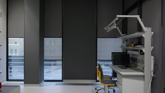 Empty engineering laboratory with computer and equipment