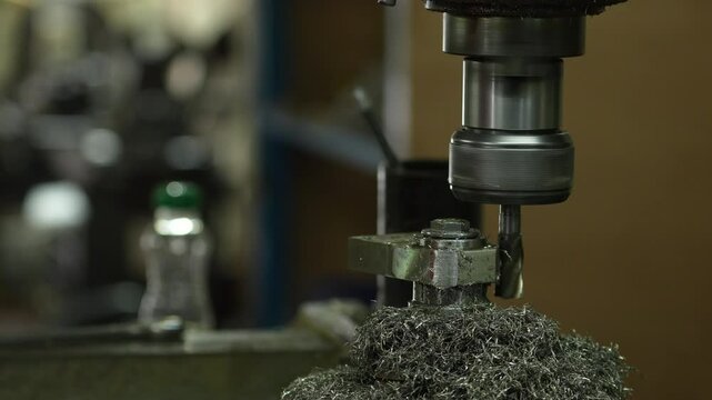 VDO 4K Lathe is working on turning metal parts for industrial use.