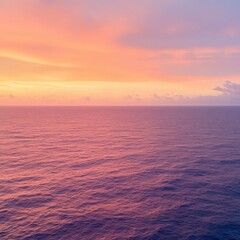Obraz premium Dramatic Ocean Sunset with Vibrant Hues of Orange Pink and Purple Colored Clouds