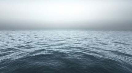 Fototapeta premium Serene ocean view under a misty sky capturing the tranquil mood of the sea with gentle waves and soft light