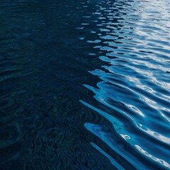 A close-up view of a shimmering blue water surface with gentle ripples