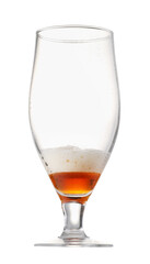Almost empty glass of beer isolated on white