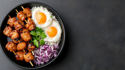 Grilled meat skewers, fried eggs, rice bowl