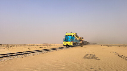 One of the powerful diesel locomotives of the train that crosses the Mauritanian Sahara desert between Zouerate and Nouadhibou. It is one of the heaviest trains in the world © Louis-Michel DESERT