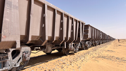 Ore wagons belonging to the train that crosses the Mauritanian Sahara desert between Zouerate and...