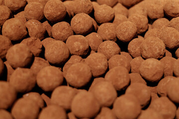 Pile of chocolate balls in a candy store