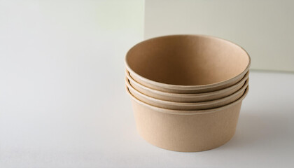 Paper bowl mockup on white surface. Container for food. Eco-friendly. Disposable tableware.