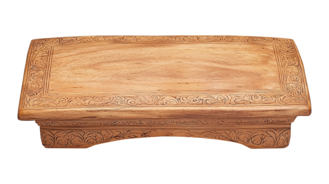 An elegant Quran stand made of carved wood, symbolizing faith