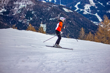 Skiers Enjoying Snowy Mountain Slopes