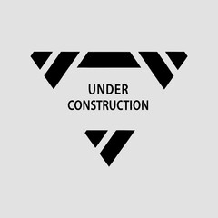 A minimalist design featuring a "Under Construction" sign with geometric shapes, indicating ongoing development or renovation.