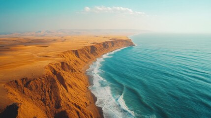 A beautiful view of a beach with a cliff in the background