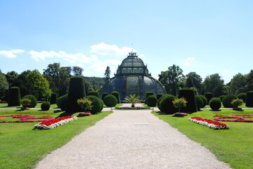 Historical greenhouse and beautiful garden in Schönbrunn Park, in Vienna, Austria. Historical...