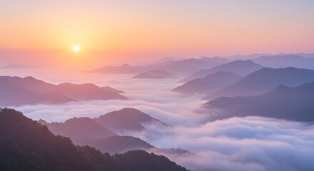 Obraz premium A breathtaking sunrise paints the sky in pastel hues above misty mountains, creating a serene, dreamlike landscape filled with peace and ethereal beauty.