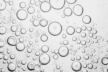 Macro bubbles,Effervescent fizz and clean cosmetics hygiene or rejuvenate renewable energy. Studio shot of transparent cosmetic blue gas bubbles under water in full-frame macro close up with selective