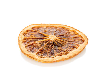 Several slices of dried grapefruit, close-up, isolated on a white background.