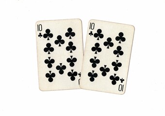 A pair of identical vintage playing cards on a white background.