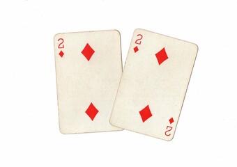 A pair of identical vintage playing cards on a white background.
