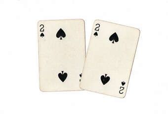 A pair of identical vintage playing cards on a white background.