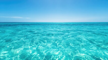 Fototapeta premium Crystal-clear turquoise waters reflect bright blue skies, creati