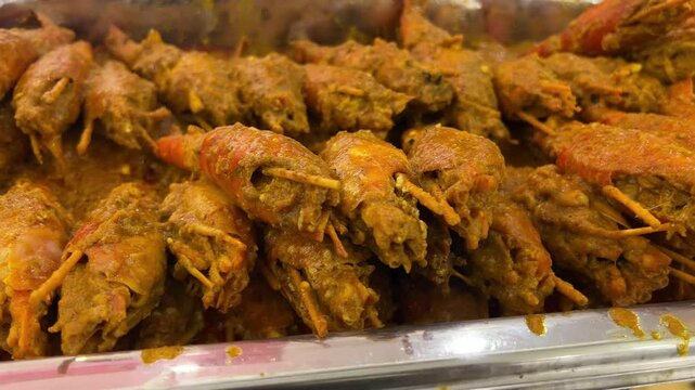 Kolkata style cooked galda chingri malaikari.