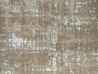 Random abstract carpet rug texture in floral ornamental pattern with golden brown color.