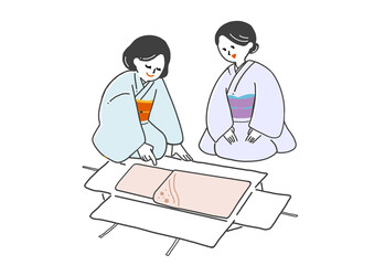 たとう紙を広げて着物を確認する無地の着物を着た2人の女性