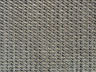 Close up photo of beautiful white woven rattan texture. Wicker art or rattan weaving art pattern in random repeated shapes. Seamless background texture.