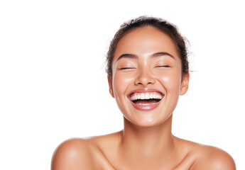 A beautiful woman with healthy, glowing skin is smiling joyfully, isolated on a white background