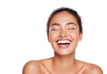 A beautiful woman with healthy, glowing skin is smiling joyfully, isolated on a white background