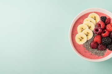Colorful smoothie bowl topped with fresh fruits, chia seeds, and