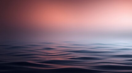 Gentle ocean waves roll under a dreamy pink and purple sky, creating a serene and calming seascape.