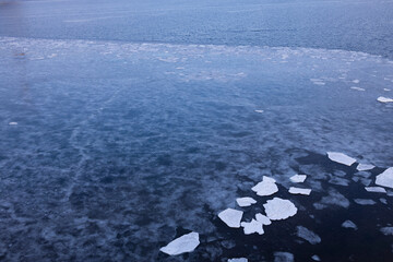 Drifting ice floes in the ocean