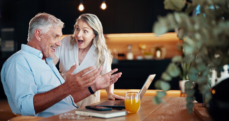 Home, senior couple and surprised with laptop for good news, financial goals and investment success. Excited, man and woman with old people for finance stability, celebrate or retirement plan of 401k