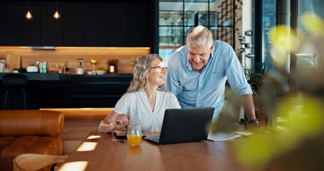 Happy, planning and laptop with old couple in home for online booking, retirement getaway and travel reviews. Smile, anniversary holiday and research with senior man and woman for trip schedule © peopleimages.com
