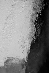 Abstract ice and snow surface; winter; footsteps on the snow