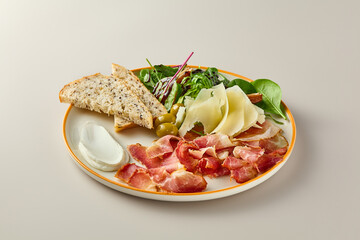 Elegant Wine Antipathies Gourmet Plate with Parmesan, Prosciutto, Olives, and Toast