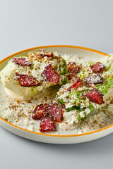 Elegant Roast Beef Salad with Romano Leaves and Vitello Tonnato Sauce - Minimalist Gourmet Photography