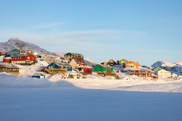Sisimiut in Greenland in a snow landscape covered in sun shine © Sarah Østergaard