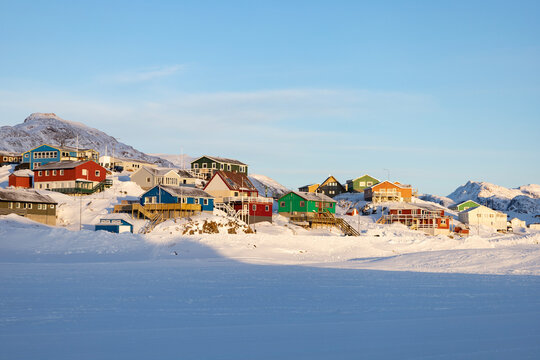 Sisimiut in Greenland in a snow landscape covered in sun shine