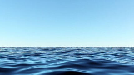 Obraz premium Calm Ocean Surface with Clear Blue Sky and Gentle Waves
