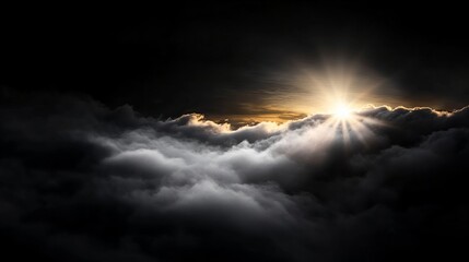 Obraz premium Sunlight breaking through dramatic clouds in a dark sky at sunset